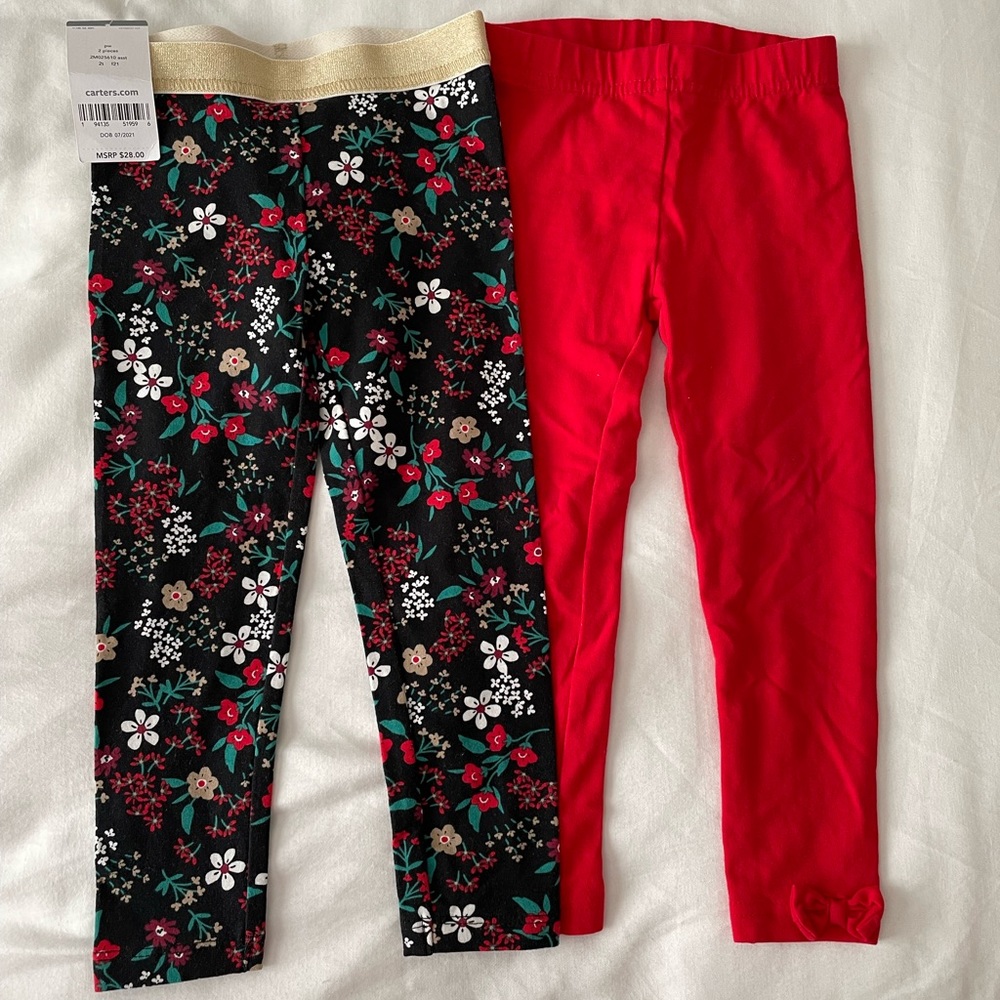 2 pairs of Carters leggings pants. Holiday print. Size Toddler 2T.